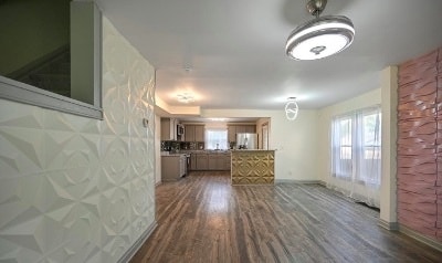 View from Front door of Living Area open to Kitchen floorplan - 519 E Hinman Ave