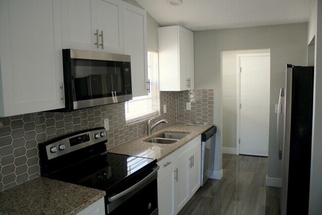 Photo - Beautifully updated over size 2 bed 2 bath 1 car garage home!