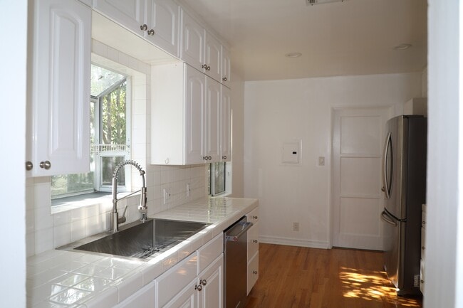 LARGE KITCHEN w/ NEW APPLIANCES w/ NEW STAINLESS-STEEL SINK, FAUCET & APPLIANCES - 1413 S Beverly Glen Blvd Unit 1413