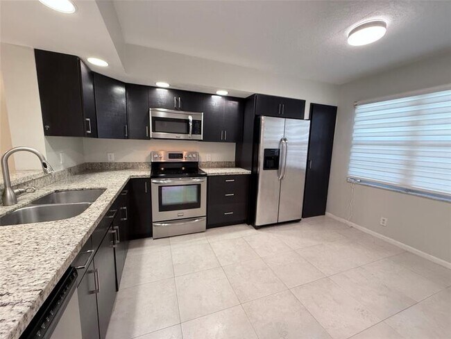 Photo - 1201 SW 128th Terrace Unit 104 E