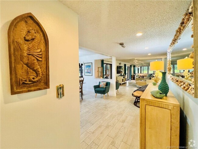 Building Photo - 10044 S Ocean Dr Unit 102 Rental