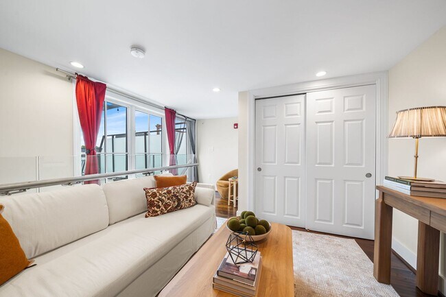 Photo - Stylish 2BR/2BA Bi-Level Condo with Private Roof Deck and Covered Parking!