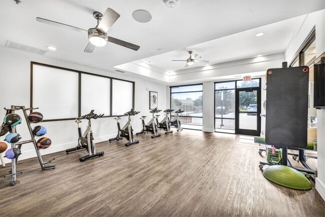 Large open gym with bikes at Markethaus 3700 in Plano Texas