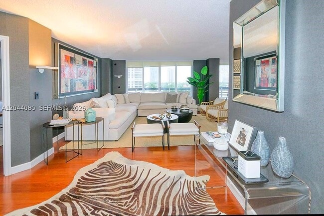 Building Photo - 3600 Mystic Pointe Dr Unit 718