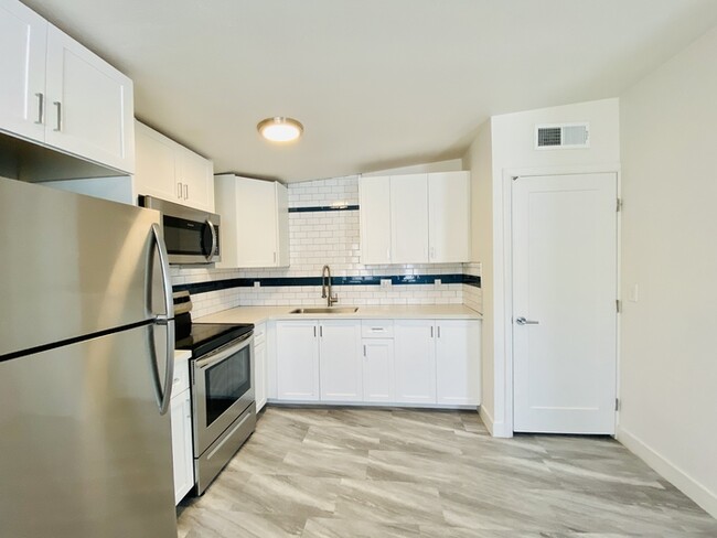 Photo - 1/2 OFF Move In Special! Modern living in this completely remodeled 3 Bed/2Bath - Community Pool ...