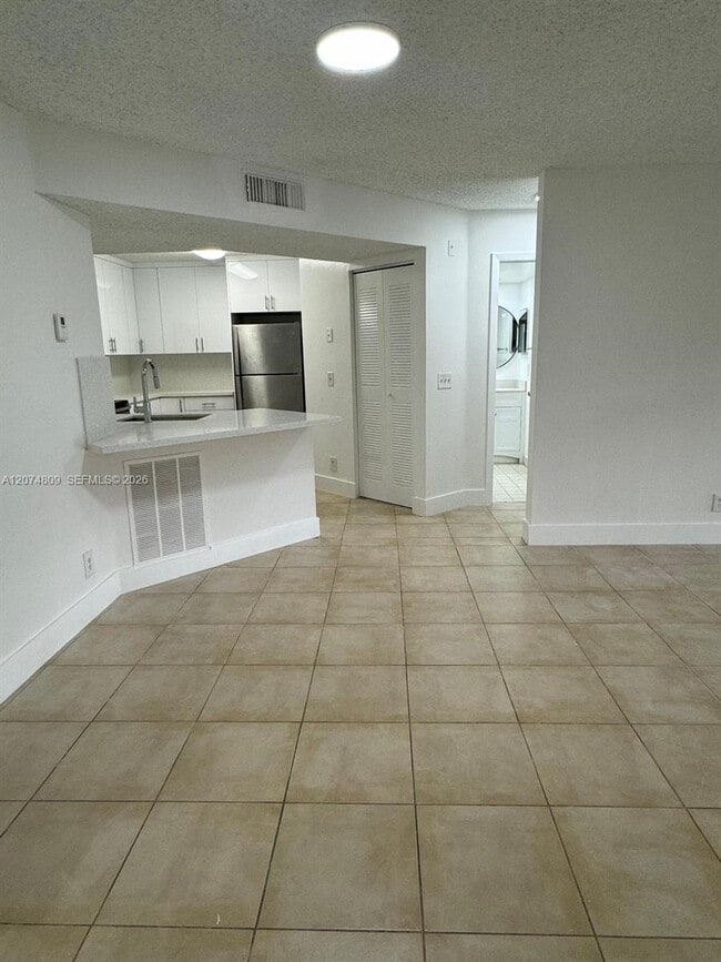 Photo - 8801 Wiles Rd Unit 103
