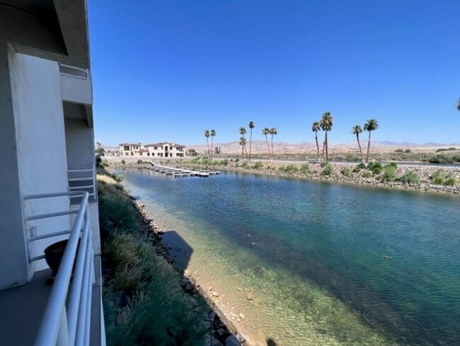 Building Photo - Riverfront 2BR 2BA Furnished Condo on GROUND LEVEL W/Garage and UTILITIES Included AVAIL 4/1/26 Unit 36