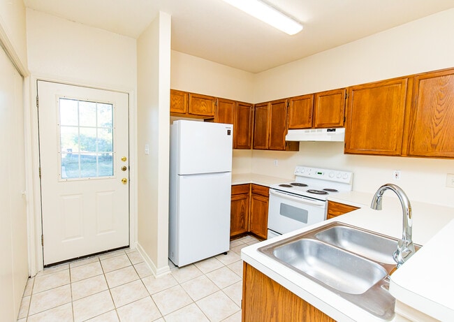 Backdoor / Kitchen - 3001 Whisper Oaks Ln Unit B