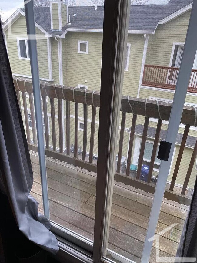 Photo - Parking Included, Central Heat/AC, In Unit Washer and Dryer, Deck, Backyard, Eat-in Kitchen