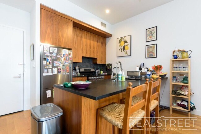 Photo - LOFT-LIKE 1 BED w PRIVATE ROOF DECK + LAUNDRY IN-UNIT Unit 4A
