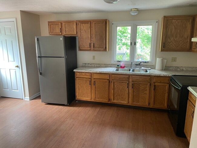 Looking into Kitchen, coat closet from livingroom - 48 Mason St