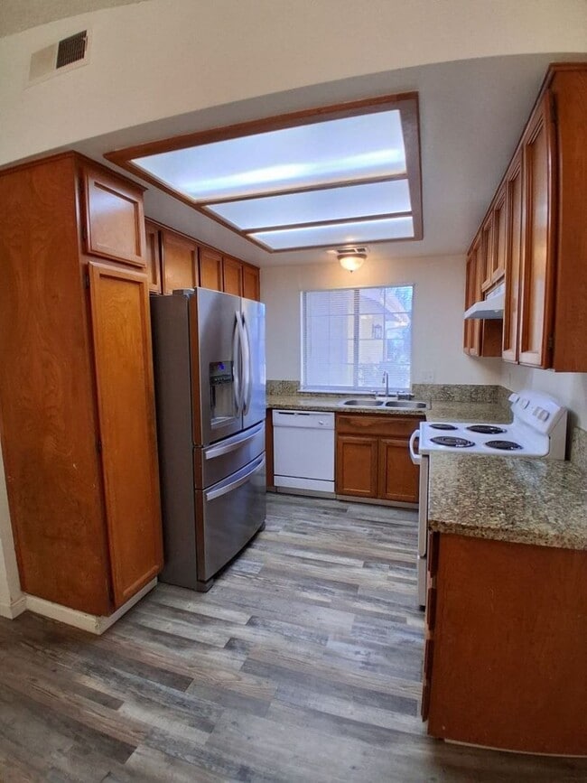 Photo - Single Level 3 BR Home w/ 2-car Garage & Backyard!