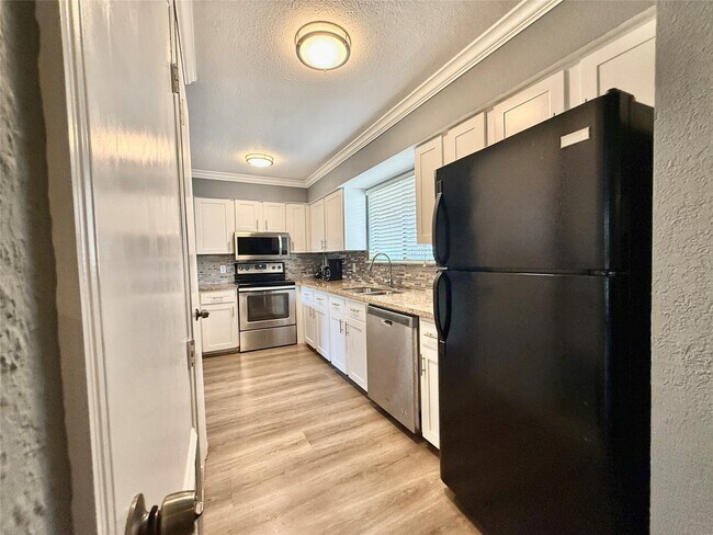 Photo - 10075 Westpark Dr Unit 92