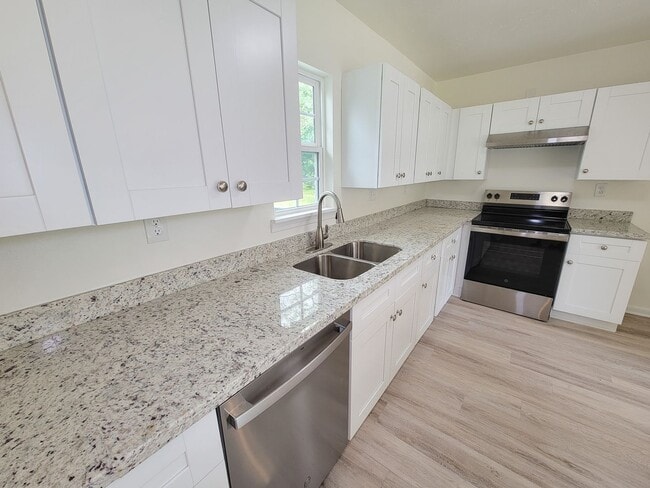 Photo - REMODELED 4 BEDROOM 2 BATH LEASE HOME IN A...