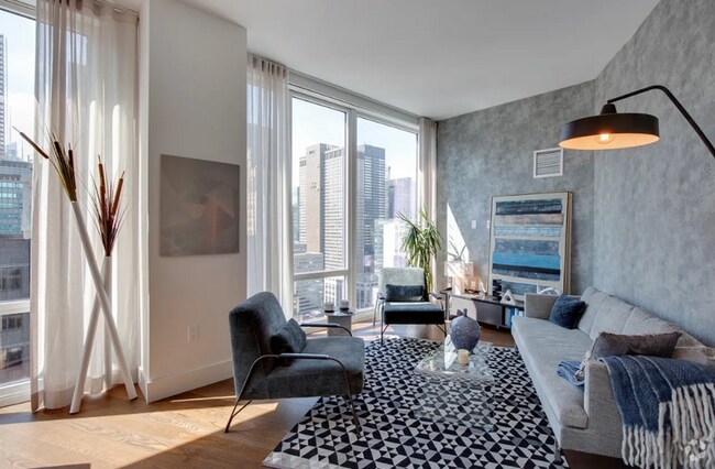 Building Photo - LUXURY 1 BED WITH SWEEPING CITY VIEWS IN P... Unit 34N Rental