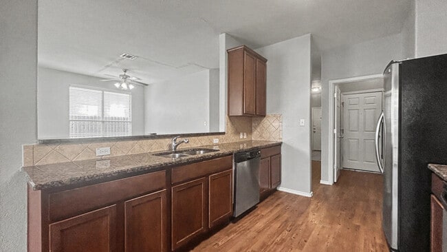 Photo - 3 Bed, 2 Bath Home with Garage & Fenced Yard / Pet-Friendly / Available now!