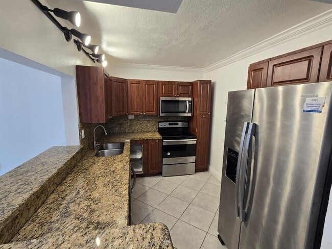 Building Photo - 4374 NW 9th Ave Unit 17-1D Rental