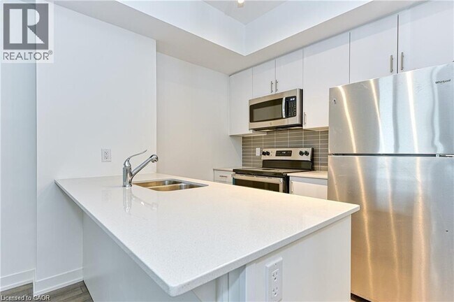 Photo - 550 N Service Rd Unité 602