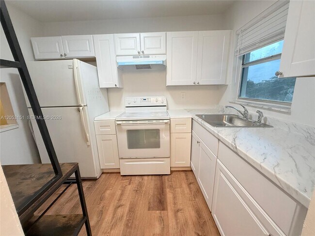 Photo - 8590 Sunrise Lakes Blvd Unit 309