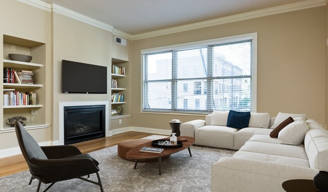 Living room with wood flooring and patio access