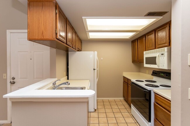 Photo - Cozy 2-Bed Condo with Fireplace, Garage & ...