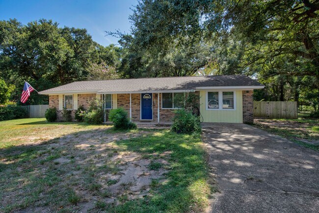 Photo - Charming Pace 3BR Home with Bonus Room, Gazebo Patio & Fenced Yard!