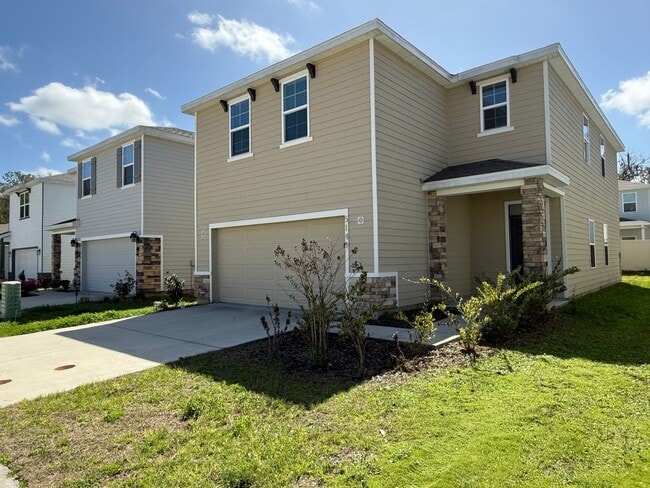 Building Photo - Spacious 4-Bedroom Modern Home in Oaks Preserve – Perfect Gainesville Location