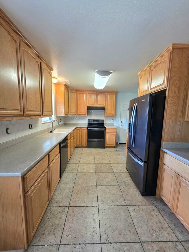 Photo - ***MOVE IN SPECIAL - $500 OFF FIRST MONTHS RENT***4BR/3BA with PRIVATE IN-LAW SUITE / SECOND LIVI...