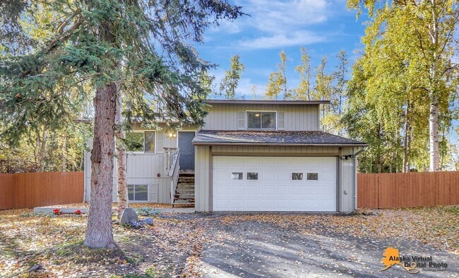 Photo - Eagle River Home w/ Fenced Yard, Sunroom, and Garage!