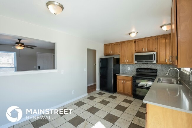 Photo - 2520 E 98th Ave