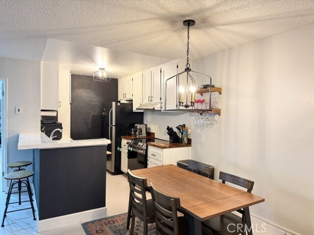 Building Photo - 23515 Lyons Ave Unit 105