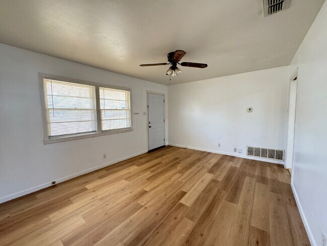 Photo - Cozy 2/1 Single-Family Home with Fresh Floors & 1-Car Garage