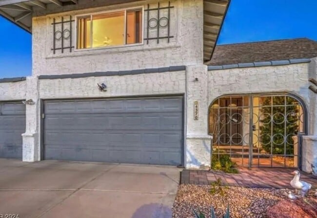 Building Photo - This stunning five-bedroom home, is an entertainer's dream!