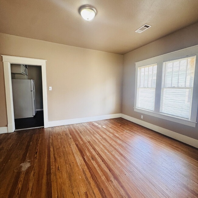 "Charming 3-Bedroom Port Arthur Home with Warm Hardwood Floors – 1237 Sq Ft of Comfort!"