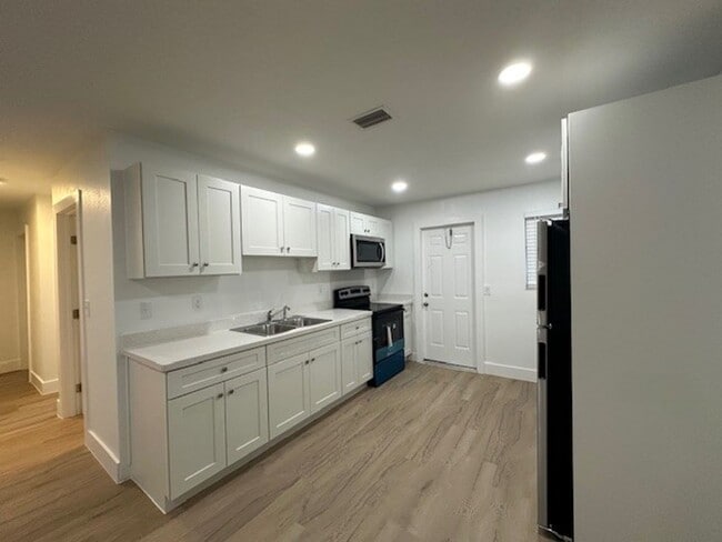 Photo - 108 Premiere LLC & 128 Premiere LLC