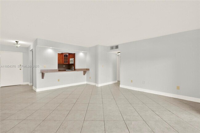Photo - 1335 W 68th St Unit 207