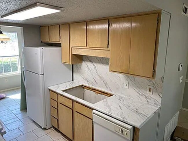 Photo - Available January 1st! 2 Bedrooms, 1.5 Bathrooms Two-Story Townhouse in Farmington