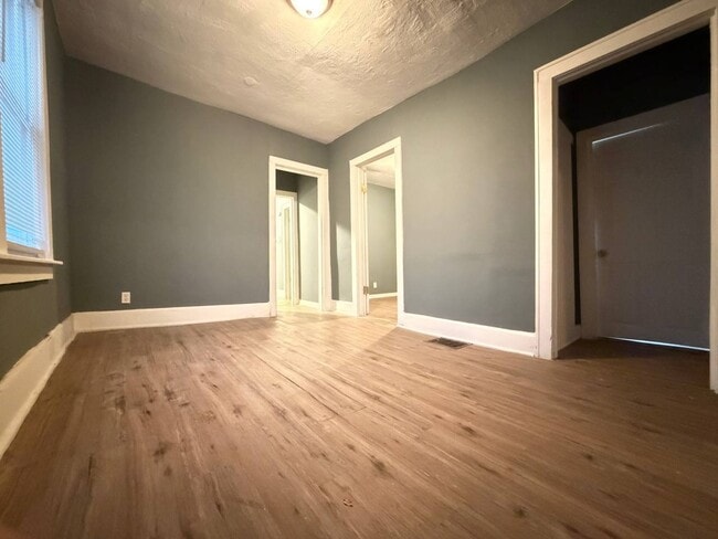 Photo - 3BR Single-Family Home with Basement & Off-Street Parking