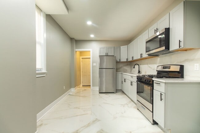 Building Photo - Spacious 3-Bedroom Single-Family Row Home ...