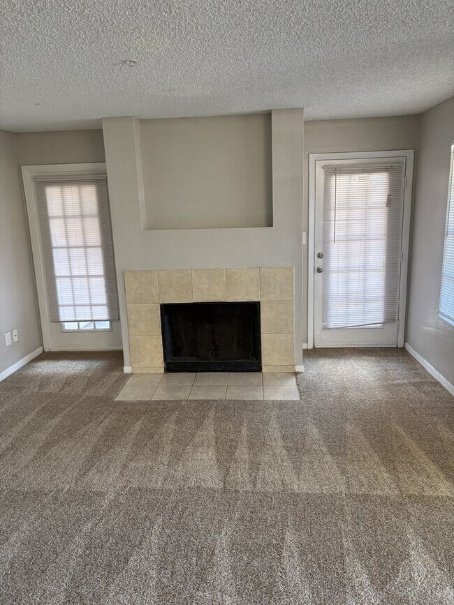 Photo - 1st floor unit with fire place and large patio