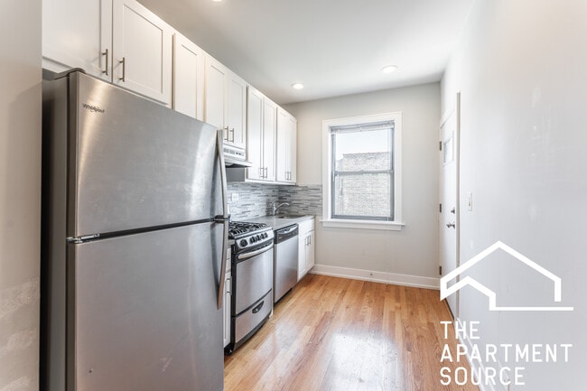 Building Photo - 4549 N Leavitt St Unit 3