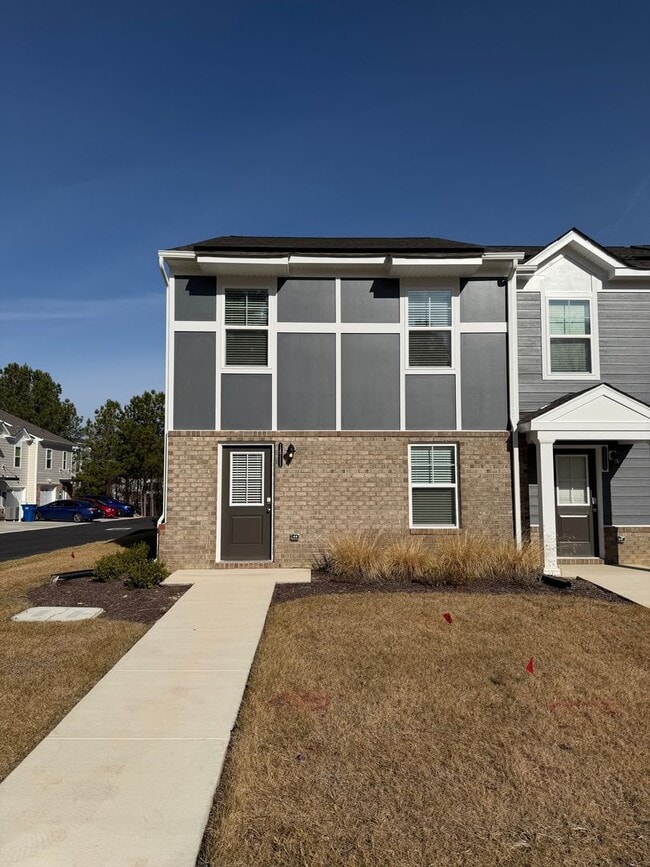 Photo - Modern Two-Story Townhome with Open Floor Plan and Garage