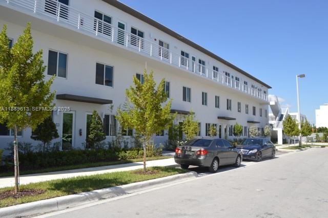 Building Photo - 6416 NW 102nd Ct Unit 110