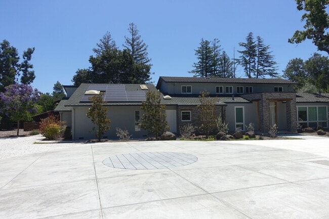 Photo - Spectacular excecutive home, sleek modern remodel, peaceful grounds, with massive pool. Easy acce...