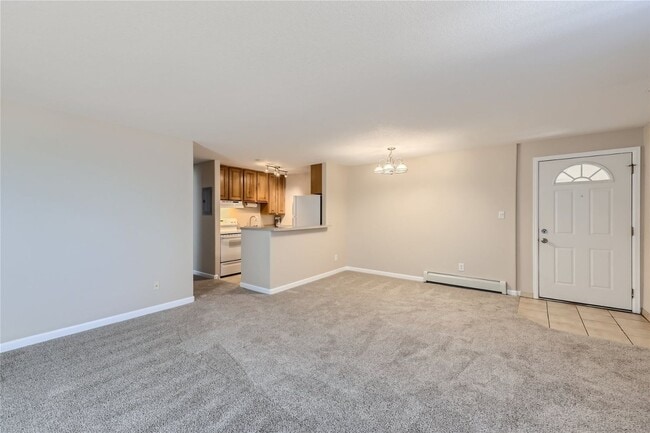 Photo - Top-floor, 2-bed 1-bath condo located near the highly desirable Old Town Arvada! Unit 301