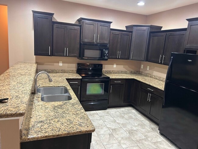 Building Photo - 7446 S Louise Ave Unit 204 Rental
