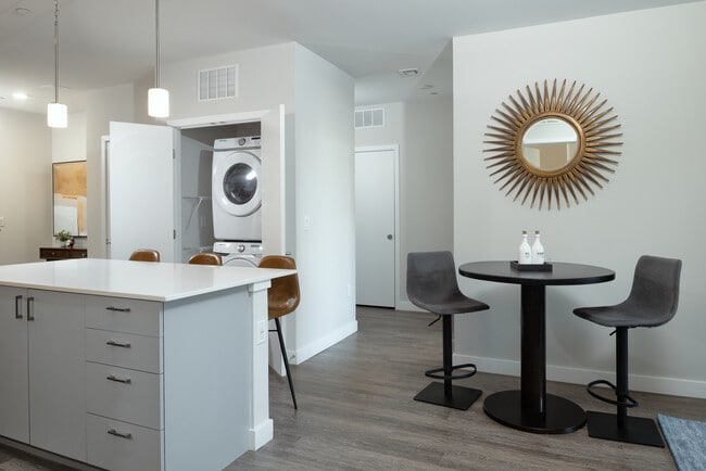 Kitchen and dining area with hard surface flooring