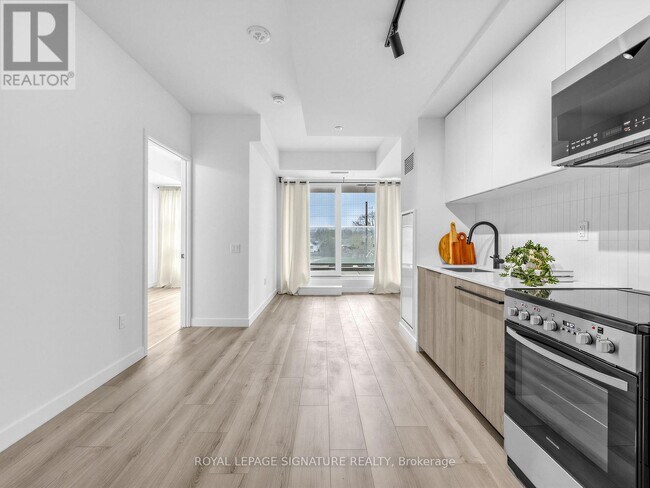 Photo - 1635 Military Trail Unit 210A