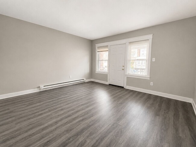 Photo - Spacious 3-Bedroom Rental with Front Porch, Backyard & Basement