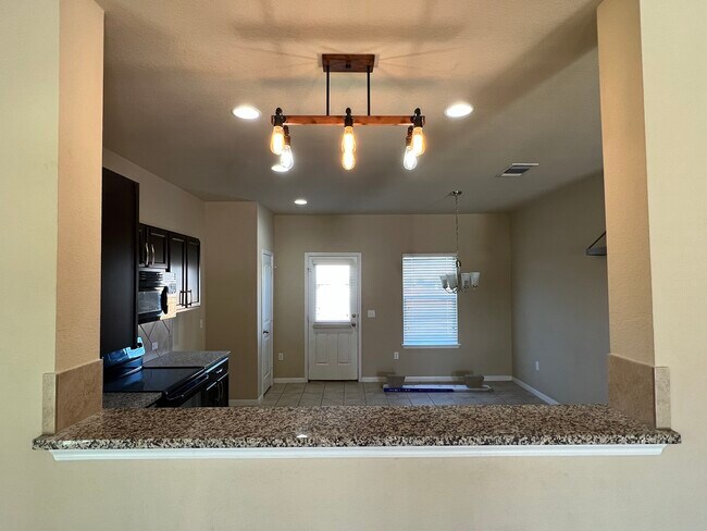 Kitchen with granite counter top - 104 Denton Dr
